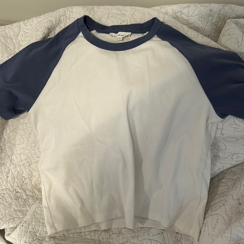 Cropped blue and white t-shirt.